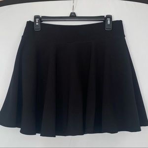 DJT tennis skirt with built in shorts. Black - XL. Textured. Never worn.